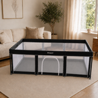 Zwarte Broyari inklapbare grondbox in een woonkamer met bank en plant - maat-120x180